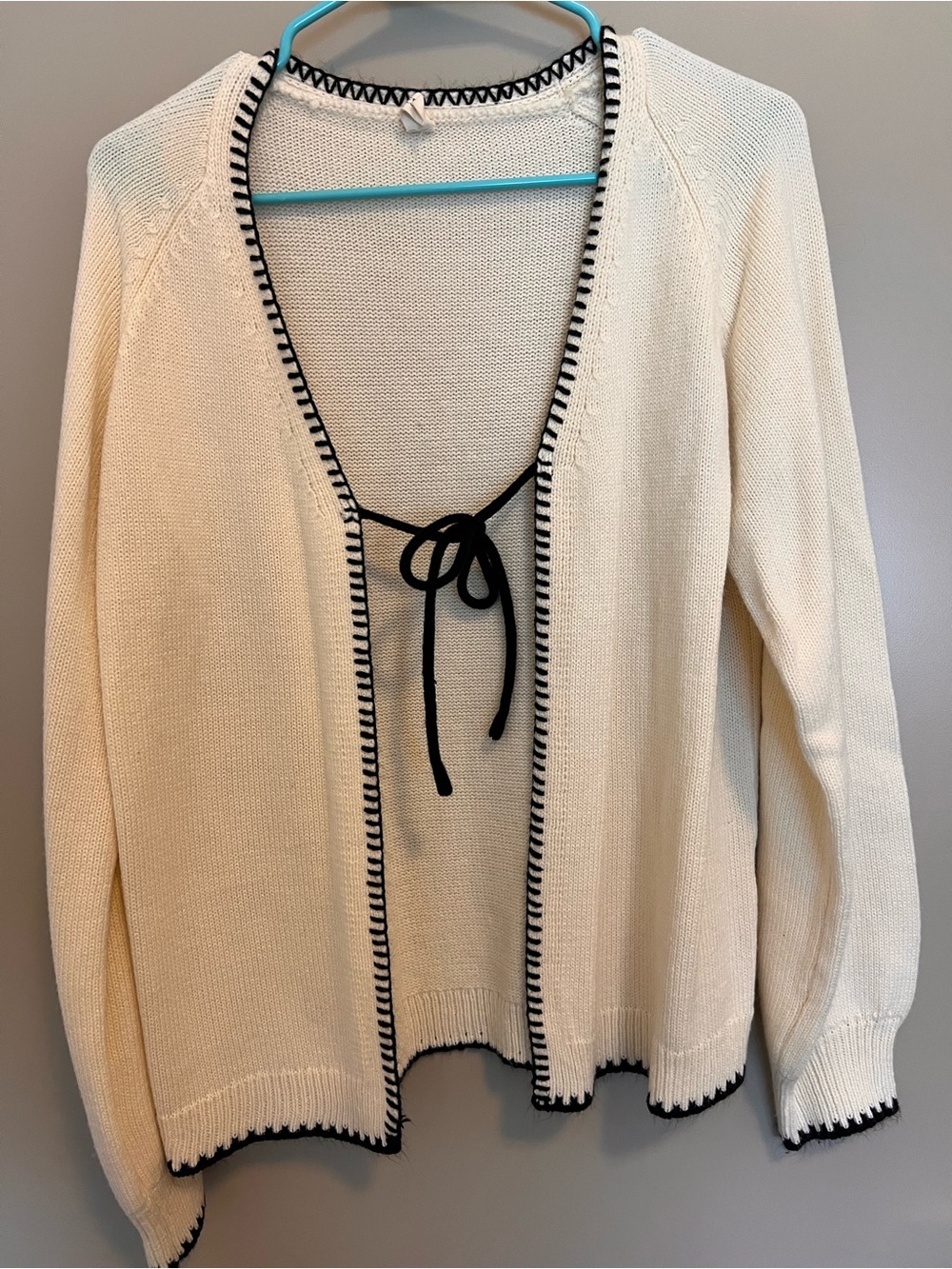 Cream Knit Open-Front Sweater with Black Trim